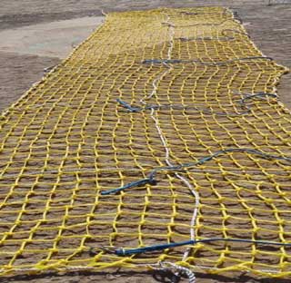 Reinforced mining safety net